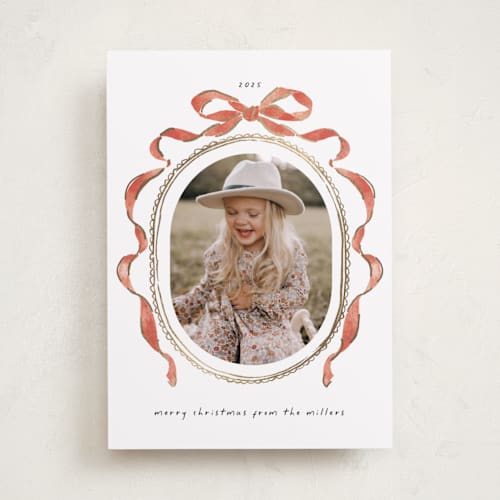 This is a pomegranate foil pressed holiday cards with foil pressed by Susan Zinader called whimsical bow printing on recycled smooth signature in standard
