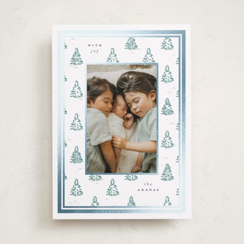 This is a blue spruce foil pressed holiday cards with foil pressed by Corinne Malesic called little trees printing on recycled smooth signature in standard
