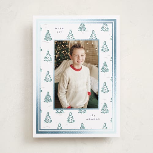This is a blue spruce foil pressed holiday cards with foil pressed by Corinne Malesic called little trees printing on recycled smooth signature in standard