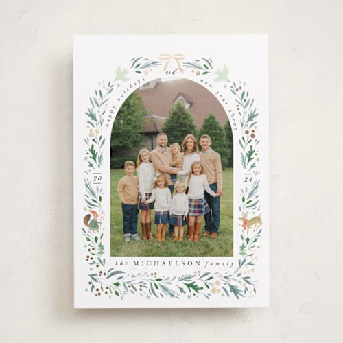This is a cypress foil pressed holiday cards with foil pressed by Hannah Williams called woodland arch printing on recycled smooth signature in standard