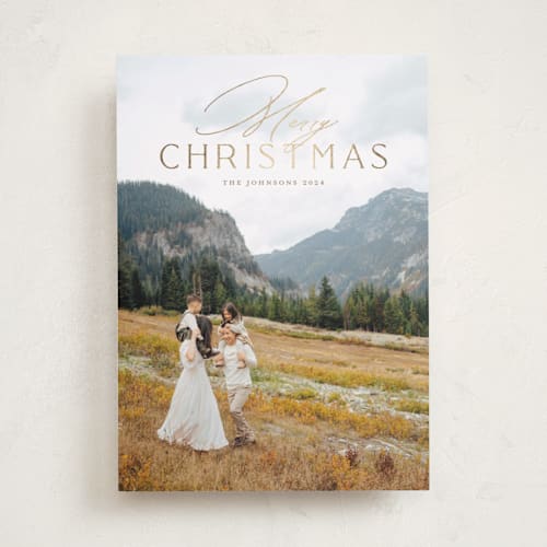 This is a champagne foil pressed holiday cards with foil pressed by Erin German called simply stated printing on recycled smooth signature in standard