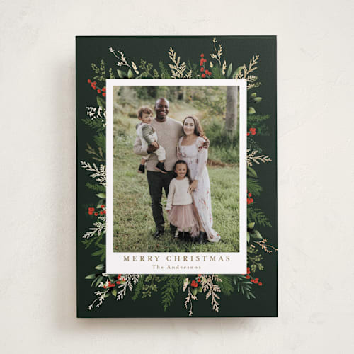 This is a holly berry foil pressed holiday cards with foil pressed by Susan Moyal called classic greenery printing on recycled smooth signature in standard