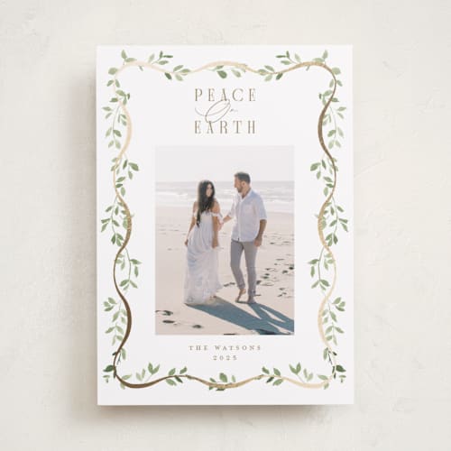 This is a snow foil pressed holiday cards with foil pressed by Everett Paper Goods called adorn framed printing on recycled smooth signature in standard