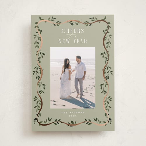 This is a sage foil pressed holiday cards with foil pressed by Everett Paper Goods called adorn framed printing on recycled smooth signature in standard