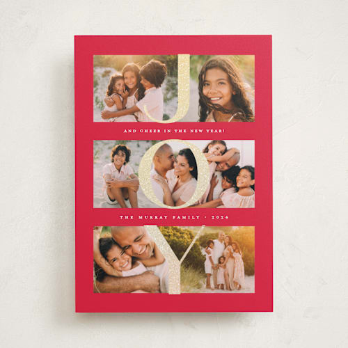 This is a ruby foil pressed holiday cards with foil pressed by Lauren Chism called joy in photos printing on recycled smooth signature in standard