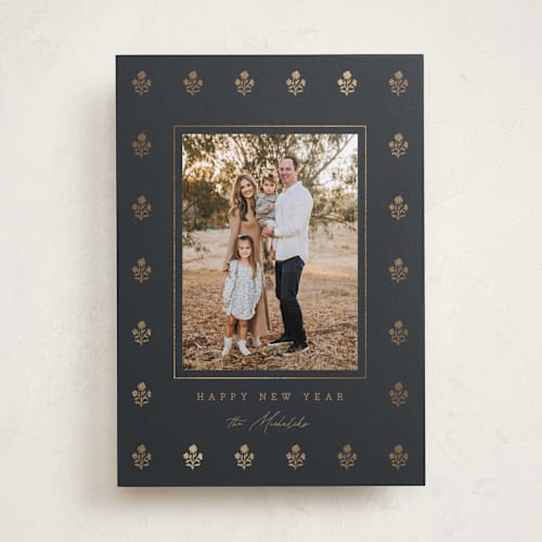 This is a coal foil pressed holiday cards with foil pressed by Angela Garrick called gilded flowers printing on recycled smooth signature in standard