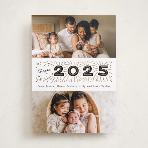 This is a noir foil pressed holiday cards with foil pressed by Alethea and Ruth called middle banner printing on recycled smooth signature in standard