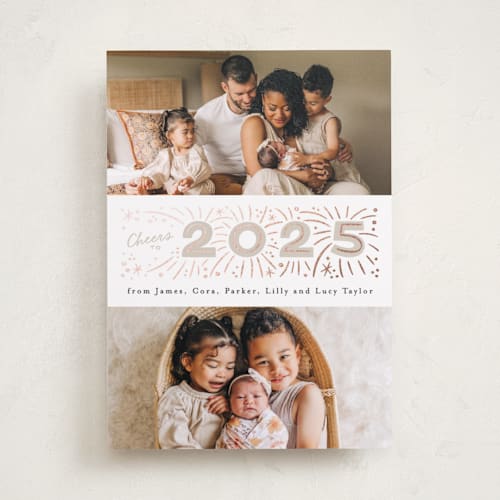 This is a buttercream foil pressed holiday cards with foil pressed by Alethea and Ruth called middle banner printing on recycled smooth signature in standard