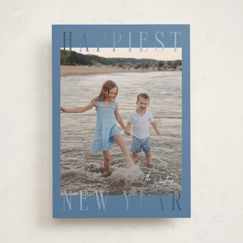 This is a glacier foil pressed holiday cards with foil pressed by Ekko Studio called headlines printing on recycled smooth signature in standard