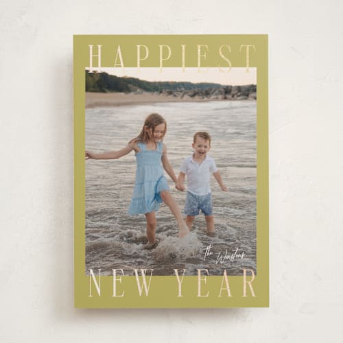 This is a spearmint foil pressed holiday cards with foil pressed by Ekko Studio called headlines printing on recycled smooth signature in standard