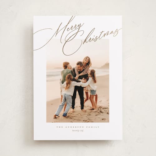 This is a golden foil pressed holiday cards with foil pressed by Jessica Williams called topper printing on recycled smooth signature in standard