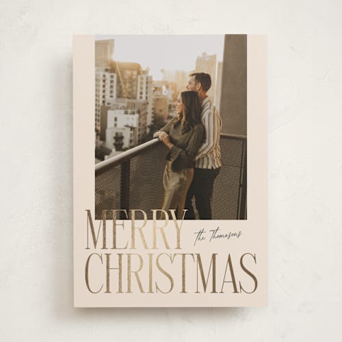 This is a eggnog foil pressed holiday cards with foil pressed by Ekko Studio called merry stack printing on recycled smooth signature in standard