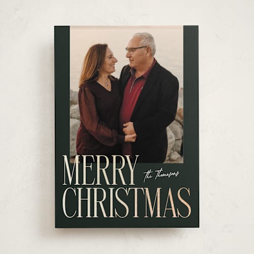 This is a evergreen foil pressed holiday cards with foil pressed by Ekko Studio called merry stack printing on recycled smooth signature in standard