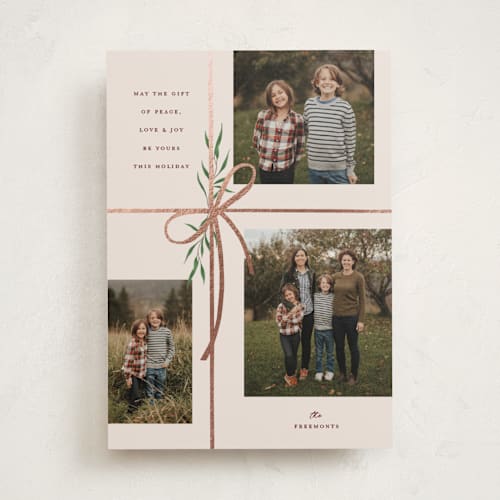 This is a burgundy foil pressed holiday cards with foil pressed by Susan Zinader called holiday gifts printing on recycled smooth signature in standard