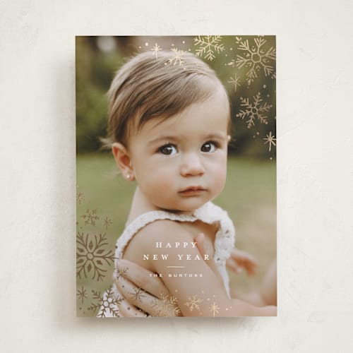 This is a snow foil pressed holiday cards with foil pressed by Wildfield Paper Co called glistening snow printing on recycled smooth signature in standard