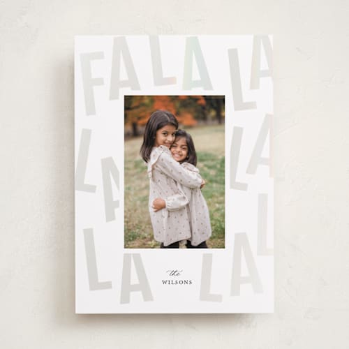 This is a snow gloss press holiday cards with gloss press by Laura Bercovich called bold fa la la printing on recycled smooth signature in standard