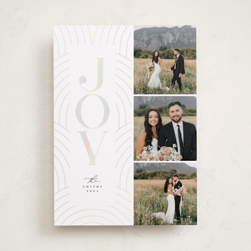 This is a raven gloss press holiday cards with gloss press by Laura Hamm called classical joy printing on recycled smooth signature in standard