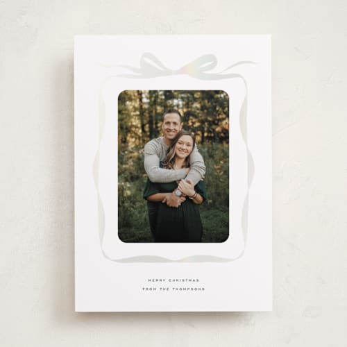 This is a evergreen gloss press holiday cards with gloss press by Olivia Kanaley Inman called bow printing on recycled smooth signature in standard