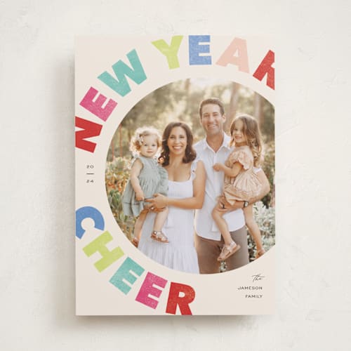 This is a neon new year photo cards with standard by Pixel and Hank called merry-go-round printing on recycled smooth signature in standard