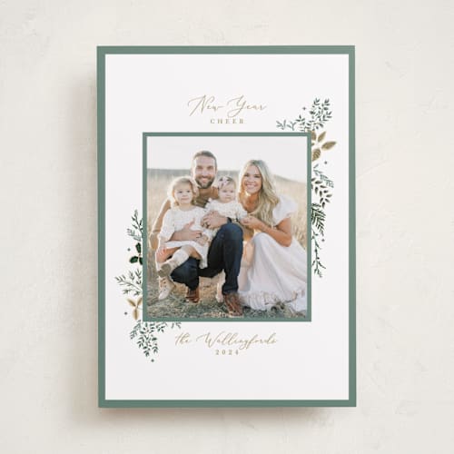 This is a snow new year photo cards with standard by Susan Moyal called wisp of greenery printing on recycled smooth signature in standard