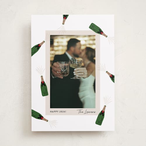 This is a snow new year photo cards with standard by Shari Margolin called popping bottles printing on recycled smooth signature in standard