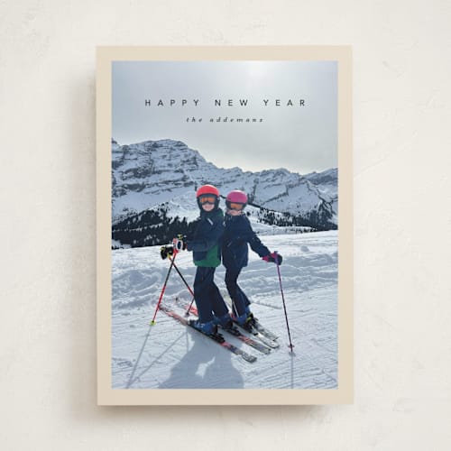 This is a buttercream new year photo cards with standard by Lucrecia Caporale called timeless charm printing on recycled smooth signature in standard