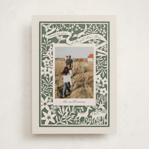 This is a pine holiday photo cards with standard by Leia Matt called woodland papercut printing on recycled smooth signature in standard