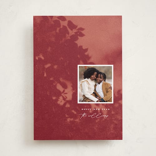 This is a cranberry holiday photo cards with standard by Snow and Ivy called penumbra printing on recycled smooth signature in standard