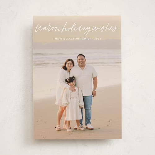 This is a snow holiday photo cards with standard by Kristen Magee called warm holiday wishes script printing on recycled smooth signature in standard