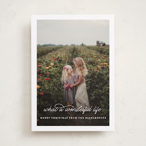 This is a snowflake holiday photo cards with standard by Leah Ragain called what a wonderful life printing on recycled smooth signature in standard