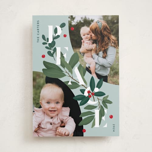 This is a wintermint holiday photo cards with standard by Julia Mehoke called peace greenery printing on recycled smooth signature in standard