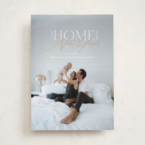 This is a brass holiday photo cards with standard by Ana Sharpe called a new home for the holidays printing on recycled smooth signature in standard