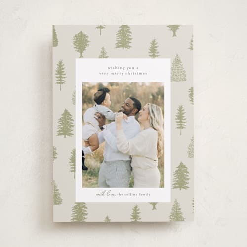 This is a greenery holiday photo cards with standard by Heather Cairl called all evergreen printing on recycled smooth signature in standard
