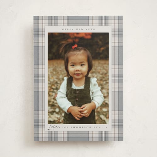 This is a linen holiday photo cards with standard by Wildfield Paper Co called tartan printing on recycled smooth signature in standard