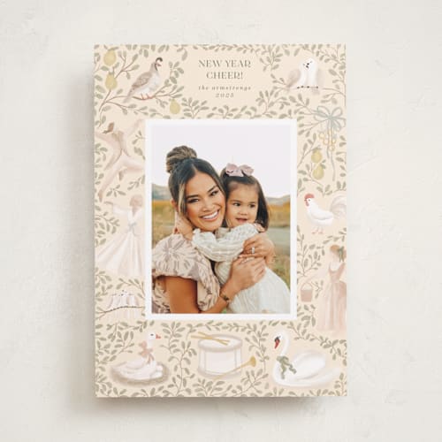 This is a buttercream holiday photo cards with standard by Jenna Holcomb called pear tree printing on recycled smooth signature in standard