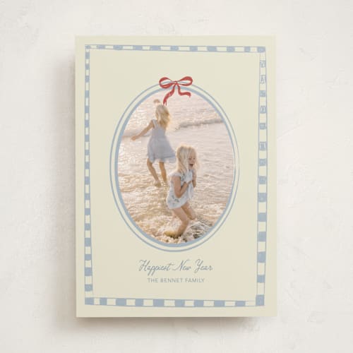 This is a celestial holiday photo cards with standard by Helena Vitto called little bow printing on recycled smooth signature in standard