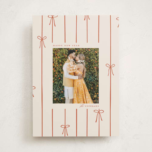 This is a cider holiday photo cards with standard by Ellen Schlegelmilch called lines of bows printing on recycled smooth signature in standard