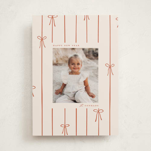 This is a cider holiday photo cards with standard by Ellen Schlegelmilch called lines of bows printing on recycled smooth signature in standard