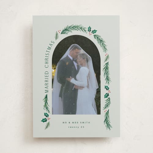 This is a sage holiday photo cards with standard by Hooray Creative called a married christmas printing on recycled smooth signature in standard