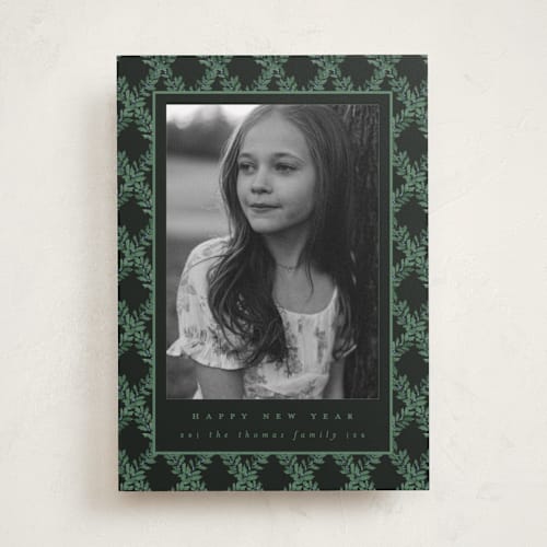 This is a charcoal holiday photo cards with standard by Leah Bisch called holly trellis printing on recycled smooth signature in standard