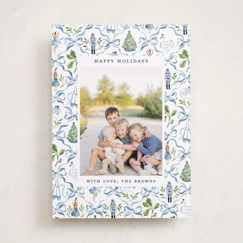 This is a blue ribbon holiday photo cards with standard by Sarah Knight called nutcracker ribbons printing on recycled smooth signature in standard
