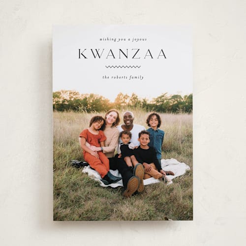 This is a coal kwanzaa cards with standard by Pixel and Hank called a joyous kwanzaa printing on recycled smooth signature in standard