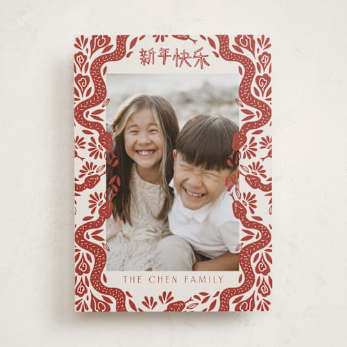 This is a crimson chinese new year cards by Katharine Watson called papercut snakes printing on recycled smooth signature in standard