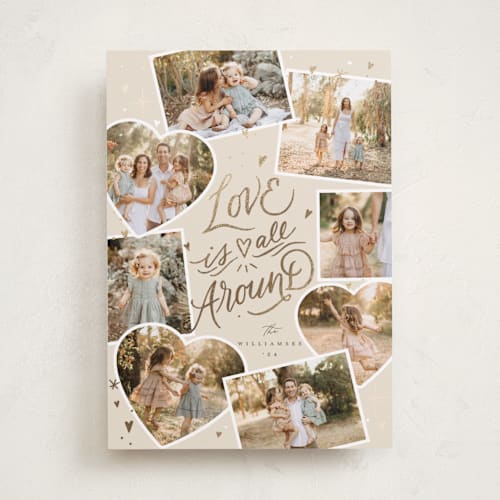 This is a cream foil stamped valentine cards with foil pressed by Stephanie Hawkes called love is all around printing on recycled smooth signature in standard