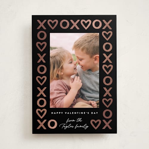 This is a coal foil stamped valentine cards with foil pressed by Alethea and Ruth called xo hearts printing on recycled smooth signature in standard