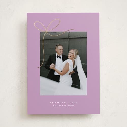 This is a lilac foil stamped valentine cards with foil pressed by Yuliya Evseeva called little bow printing on recycled smooth signature in standard