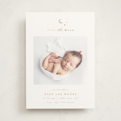 This is a blush foil stamped birth announcements with foil pressed by AK Graphics called over the moon printing on signature in standard