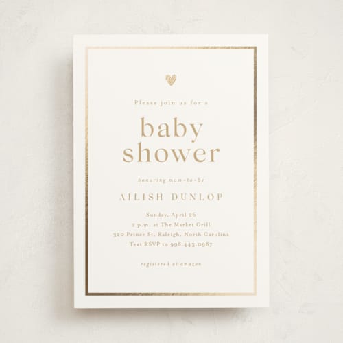 This is a golden foil stamped baby shower invitations with foil pressed by Stacey Meacham called heartbeat printing on signature in standard