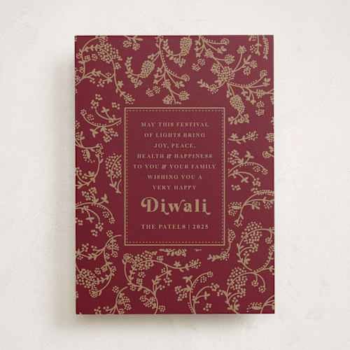 This is a ruby diwali cards with standard by Teju Reval called ornate wishes printing on signature in standard