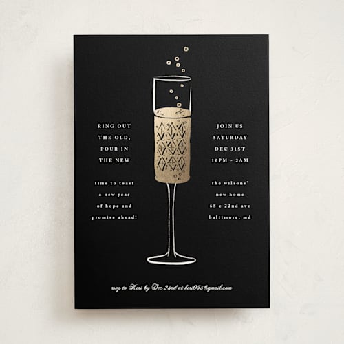 This is a midnight holiday party invitations with foil pressed by mo kelley called champagne flute printing on signature in standard